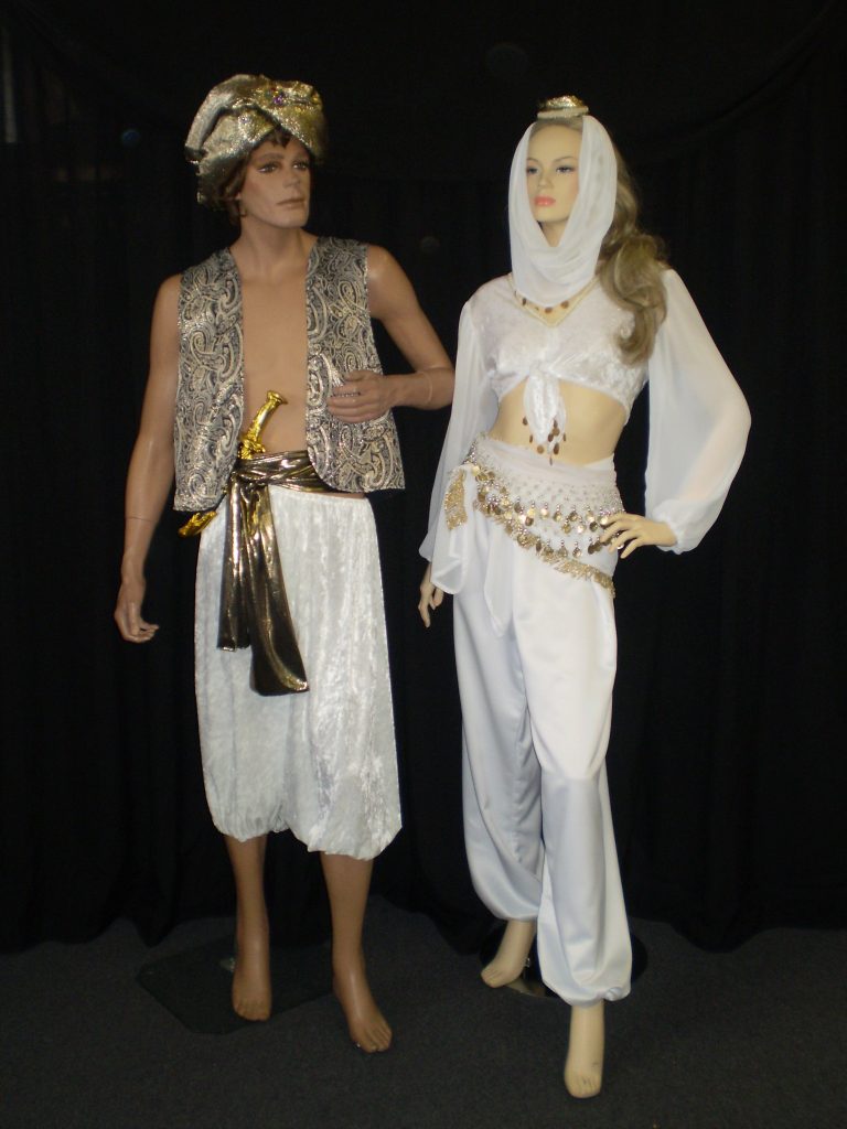 Gold and white men's and ladies costumes