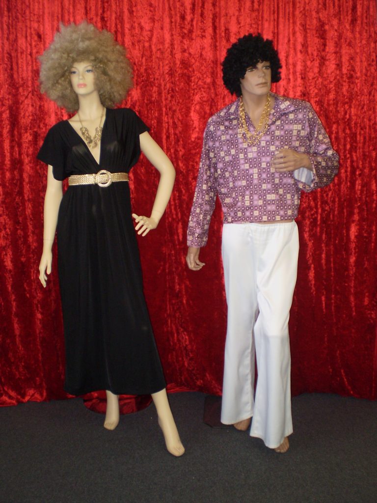 60s 70s costumes for a disco couple, black dress and jumbo afro, body shirt and white flares