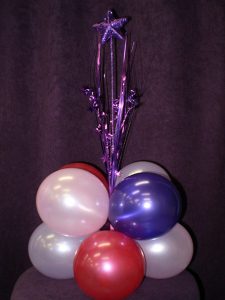 Pink and purple table balloon centre piece