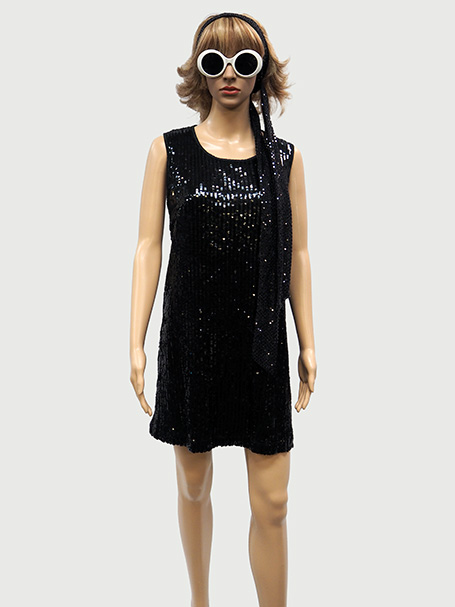 Black sequin mini dress styled with large glasses, headband * wig for a seventies disc theme party,