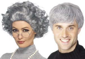 Image of a man and lady wearing grey wigs