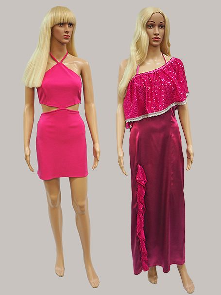 Image shows 2 mannequins dressed as Barbie in pink gowns and blond wigs