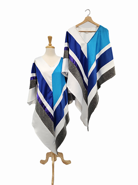 Image shows two Abba inspired costumes displayed on a mannequin and coat hanger. Blue and white poncho style costumes from Acting the Part in Carlingford Sydney