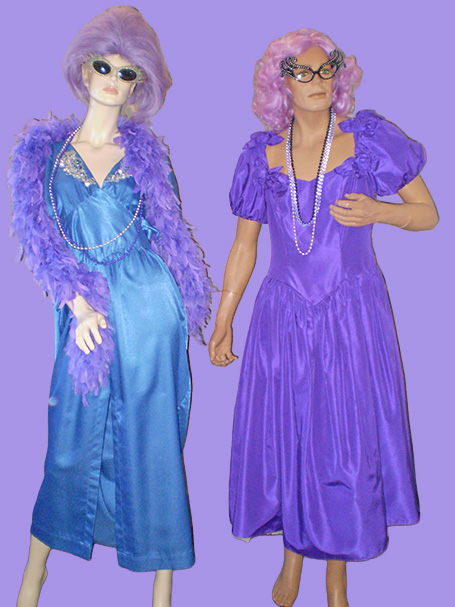 Dame Edna inspired costumes including purple dresses, wigs & glasses