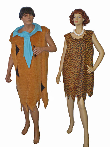 Two mannequins dressed in Flinstones inspired television costumes. The male mannequin wears a brown tunic with black patches and a blue necktie, while the female mannequin wears a leopard print dress.