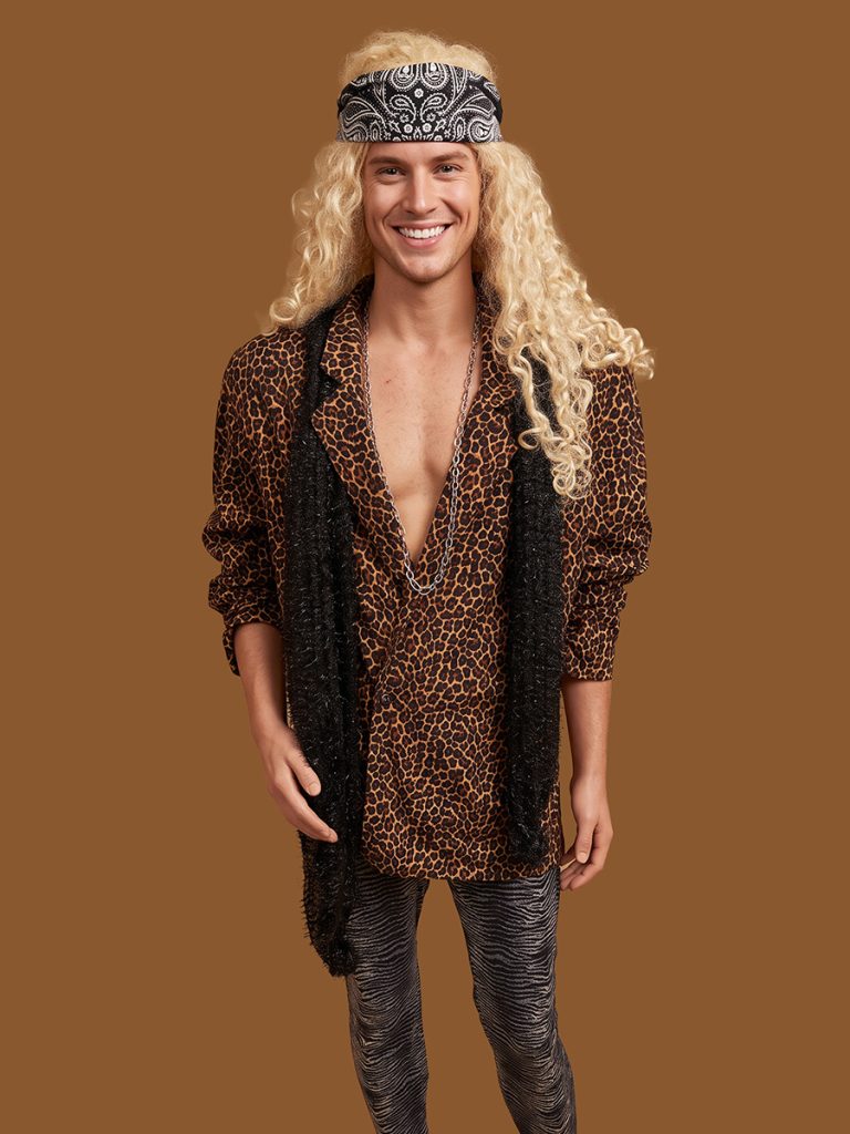 Image shows a mannequin dressed in Glam Rock fashion. Animal print 80s hair band style.