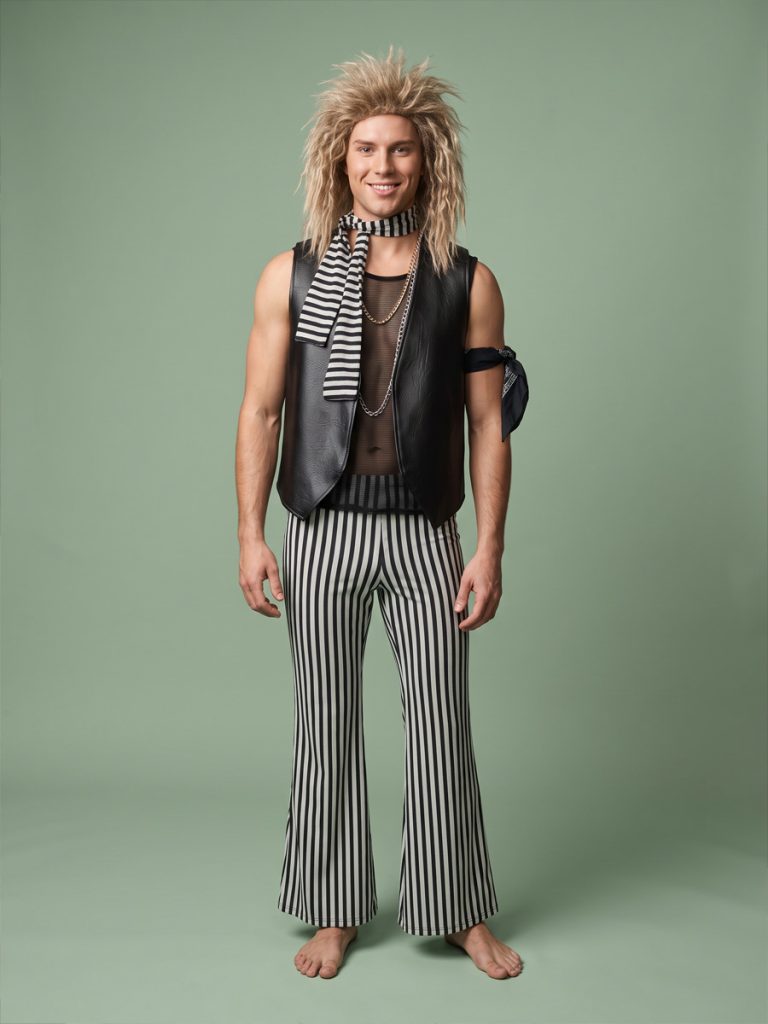 1980s costume Glam Rock style with mesh & leather look vest, stripe pants and rockstar hair